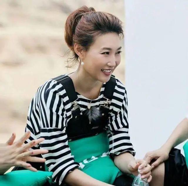 事实证明46岁“不婚不育”的李梓萌已悄悄走上了另一条人大道(图10)