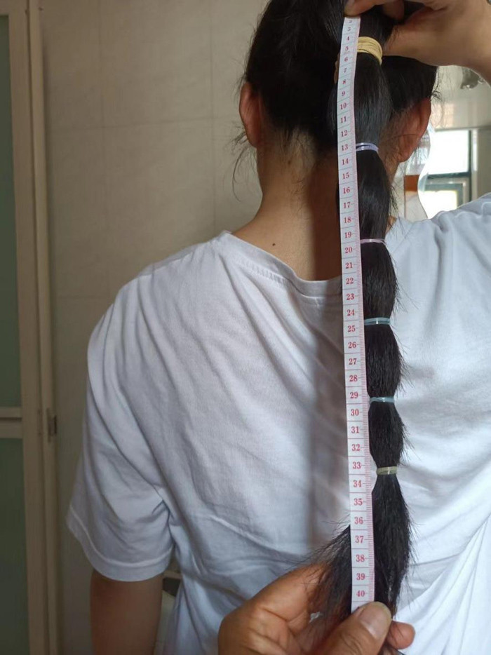 易倍体育网站：为爱“发生”安庆师大一学生蓄发550天捐赠为患癌儿童做假发(图2)